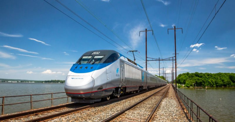 Amtrak's Acela train on the track on a sunny day