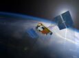Iridium NEXT satellite in orbit over earth.