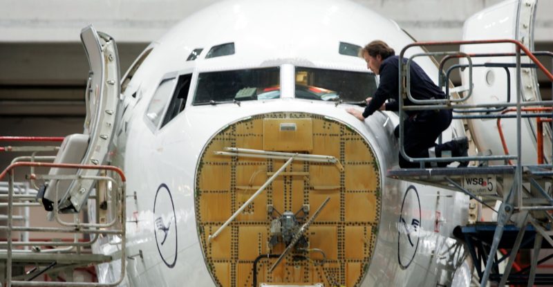 Lufthansa Technik technicians work on a 737 in Hamburg