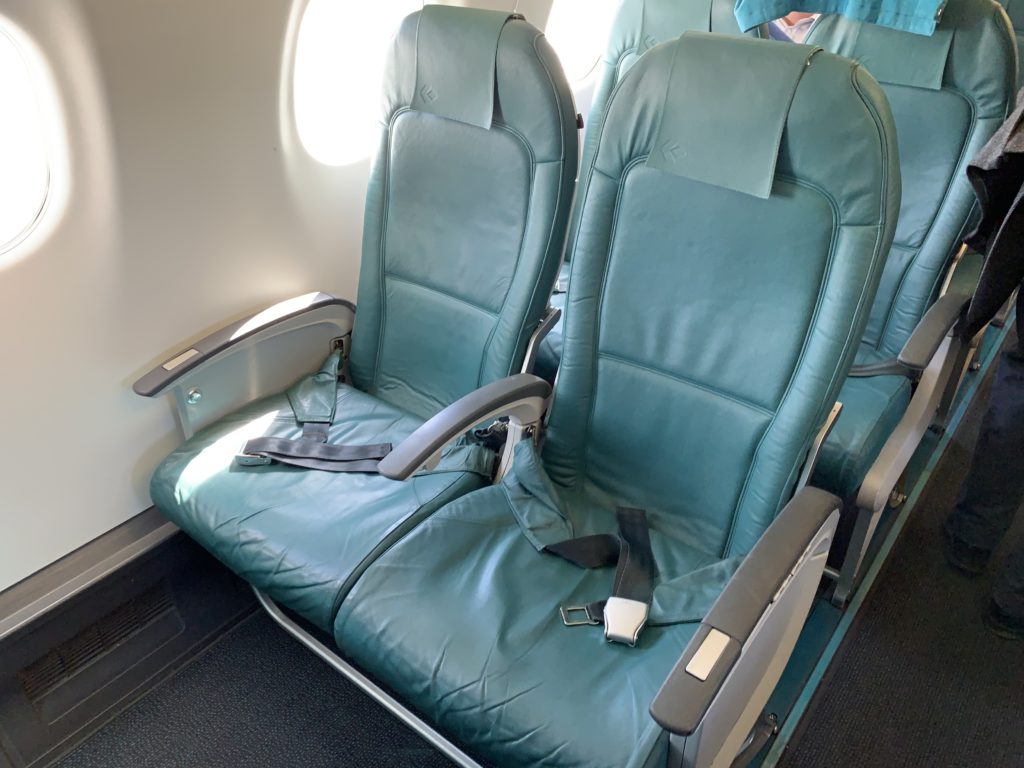 Slimline seats, with green covers, on Air Dolomiti’s E-195