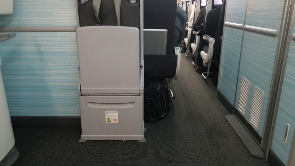 exit door area and lavatory on the Boeing 787-9