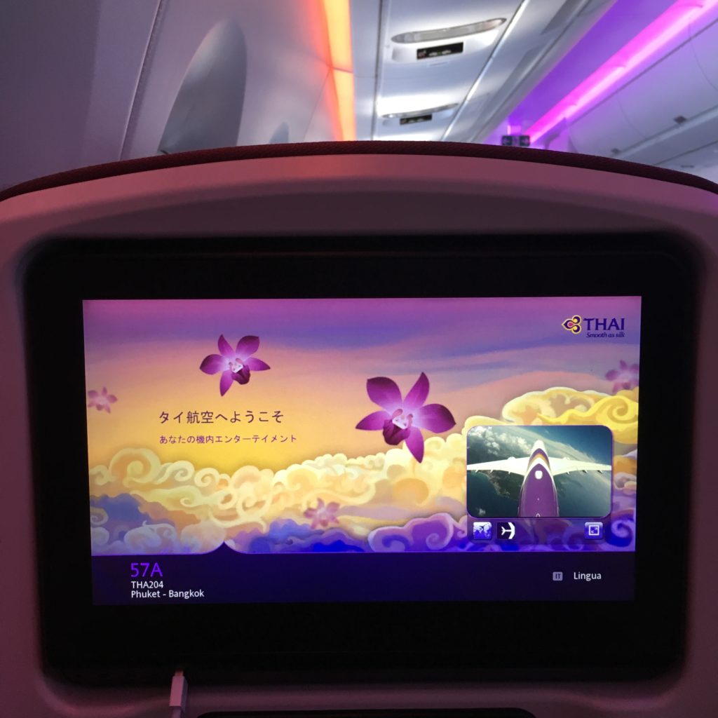 Seatback IFE showing thai's welcome page and double corner screen