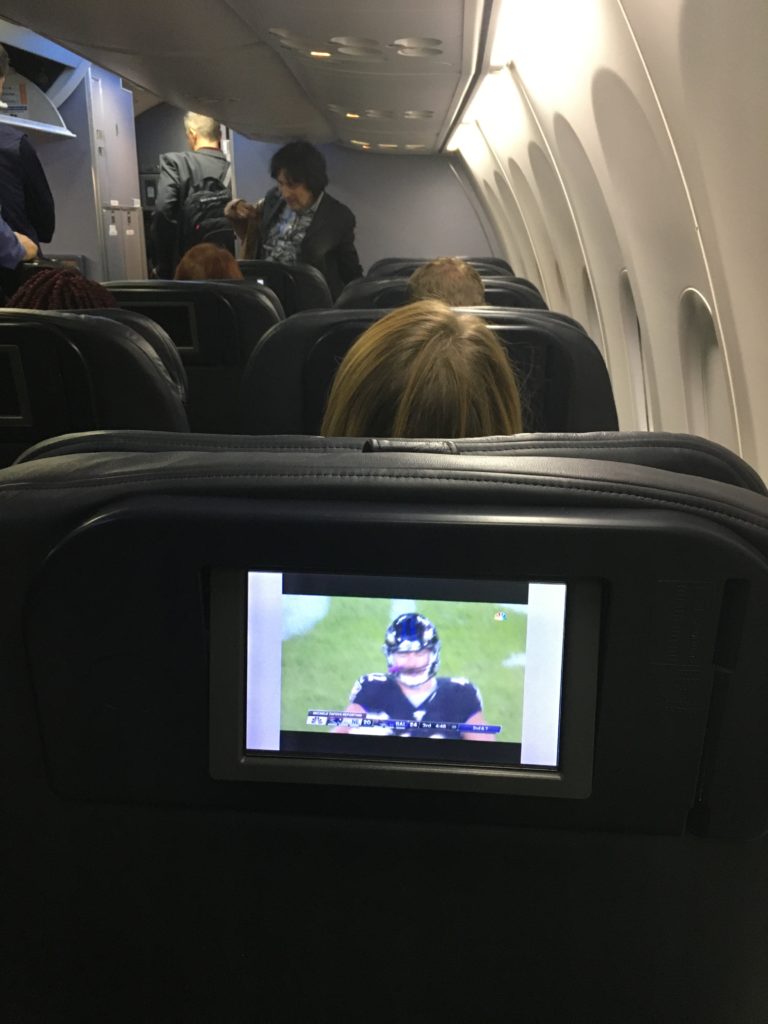 small seatback ife screen on first class cabin seat on United Airlines Boeing 737-900