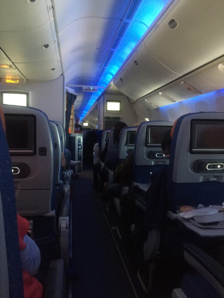 interior of aircraft cabin in Economy class