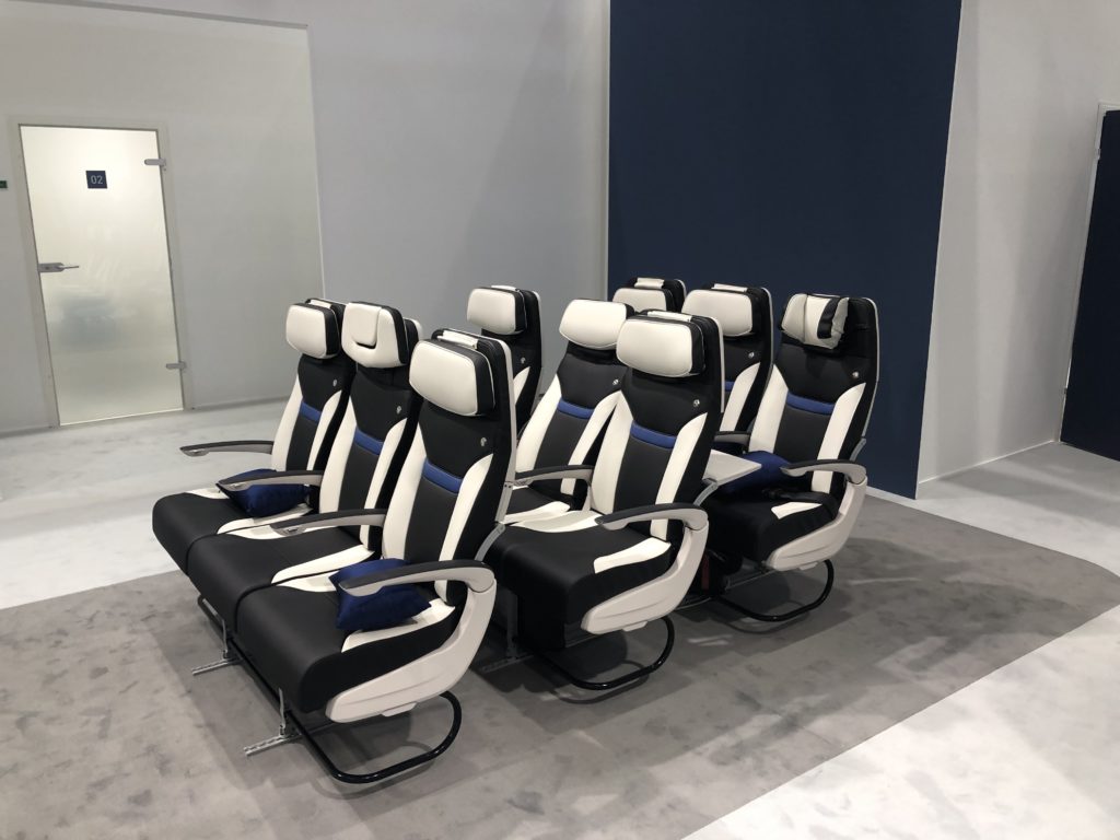 Three rows of Z400 seats on the show floor of the Aircraft Interiors Expo