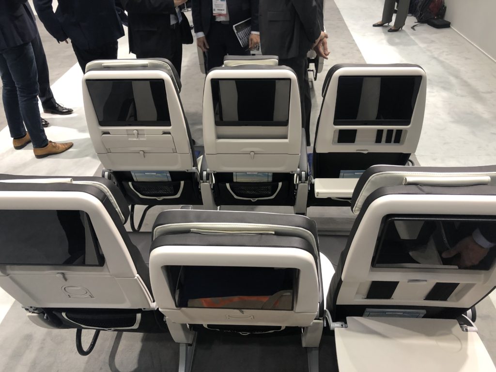 Two rows of Z400 economy class seats with seatback IFE