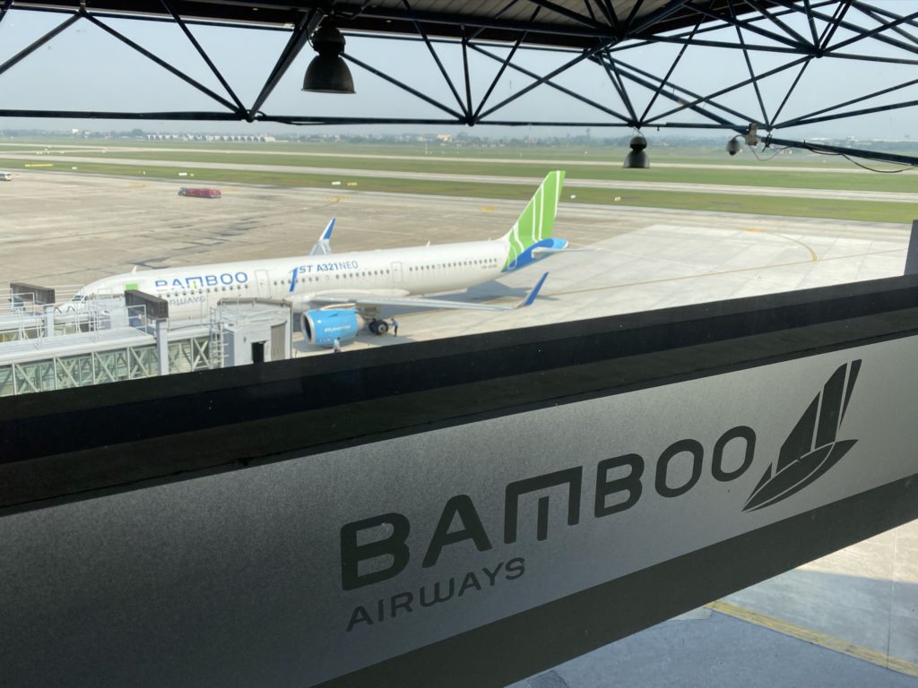 Bamboo Airways a321neo on tarmac with Bamboo Airways sign in the front 