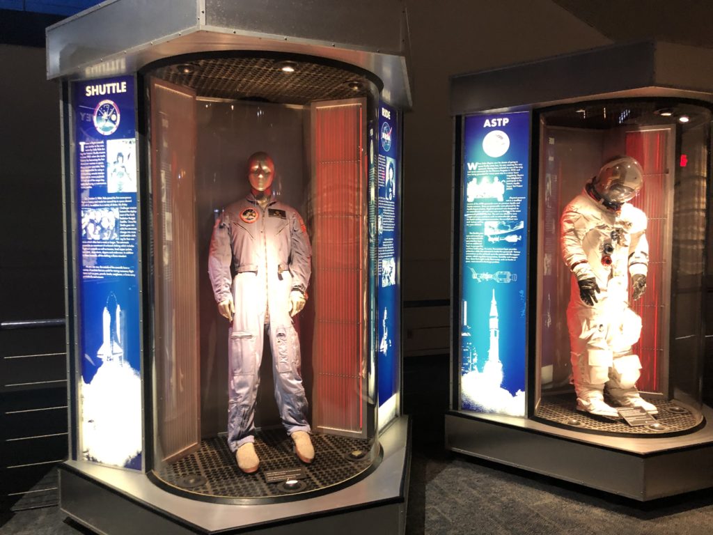 spacesuits on display in the museum