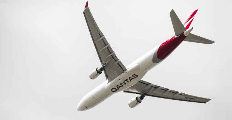 belly of a qantas aircraft in the sky