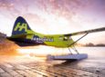 MagniX seaplane on the water at sunset