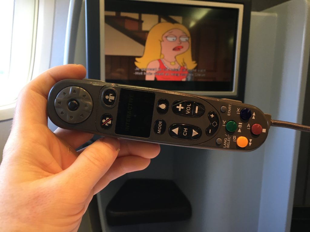 remote held up in front of ife