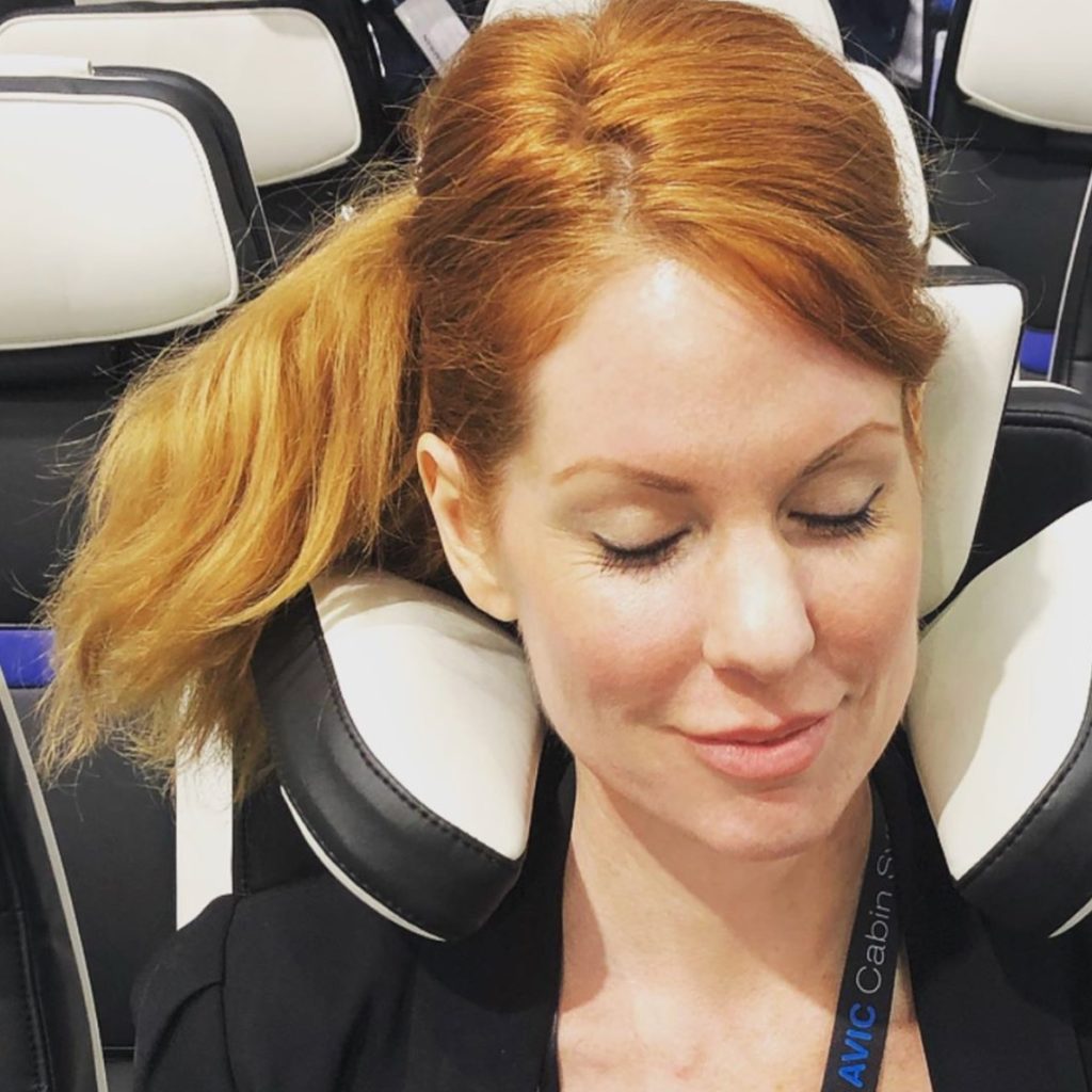 Runway Girl Network editor Mary Kirby trying the new Z400 pillow headrest