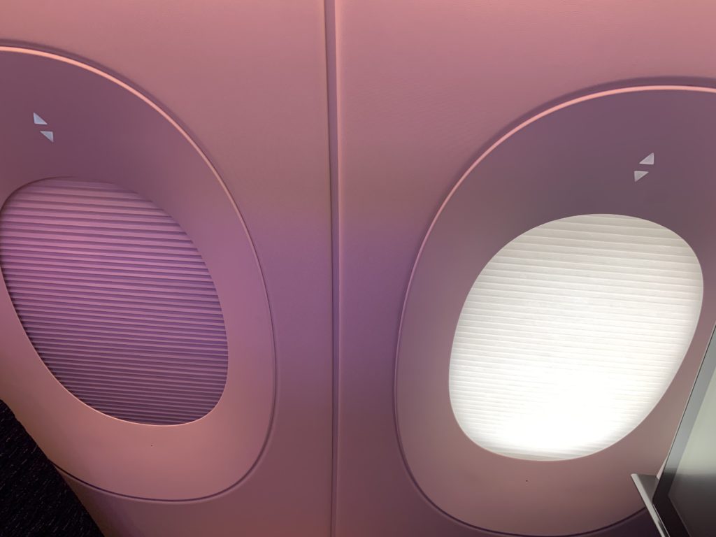 Aircraft windows showing the touch shades, featuring dark and partially opaque settings