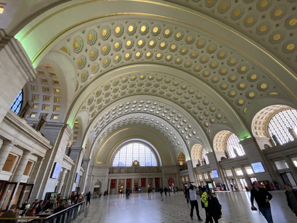 Main Union Station hall with curved ceiling and gold accents