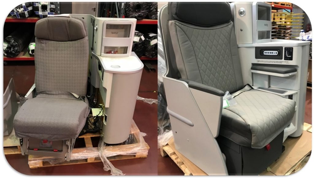 Wamos Air business class seats on the floor with white plastic and grey woven fabric 