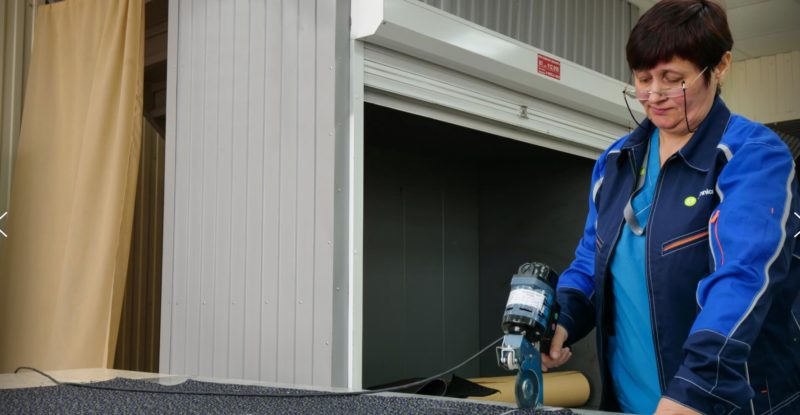 Woman making aircraft carpet