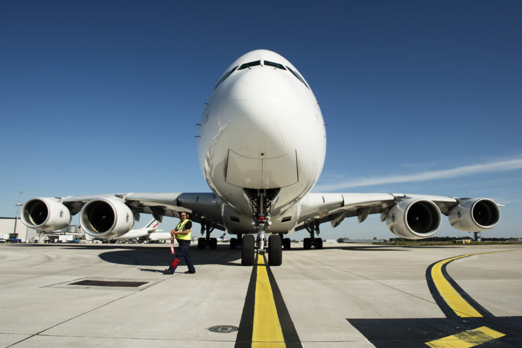 A front view of an Air France Airbus A380 parked at Paris CDG