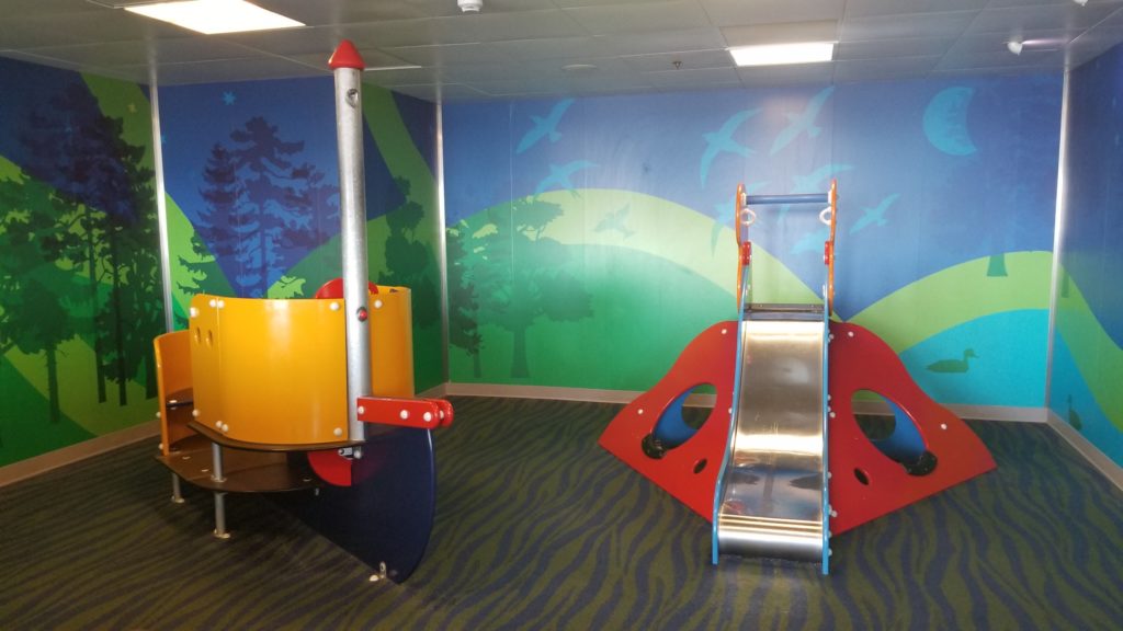 A BC Ferries playroom with slide and colorful walls