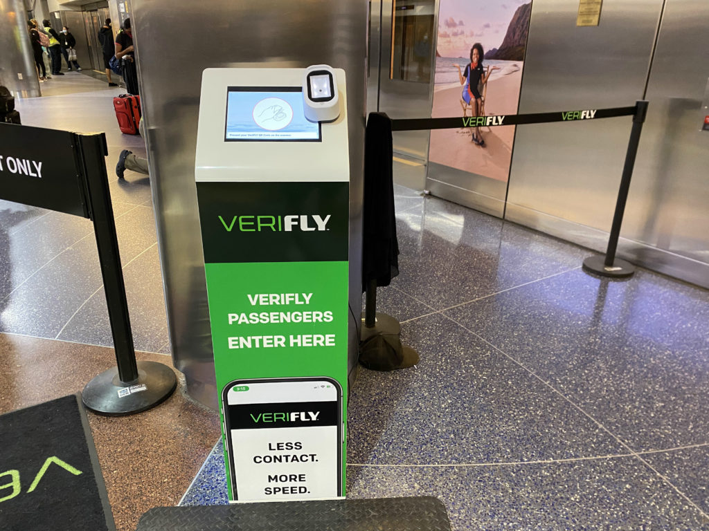 The VeriFly kiosk which scans the passengers face and takes their temperature, before allowing them to proceed to the tram