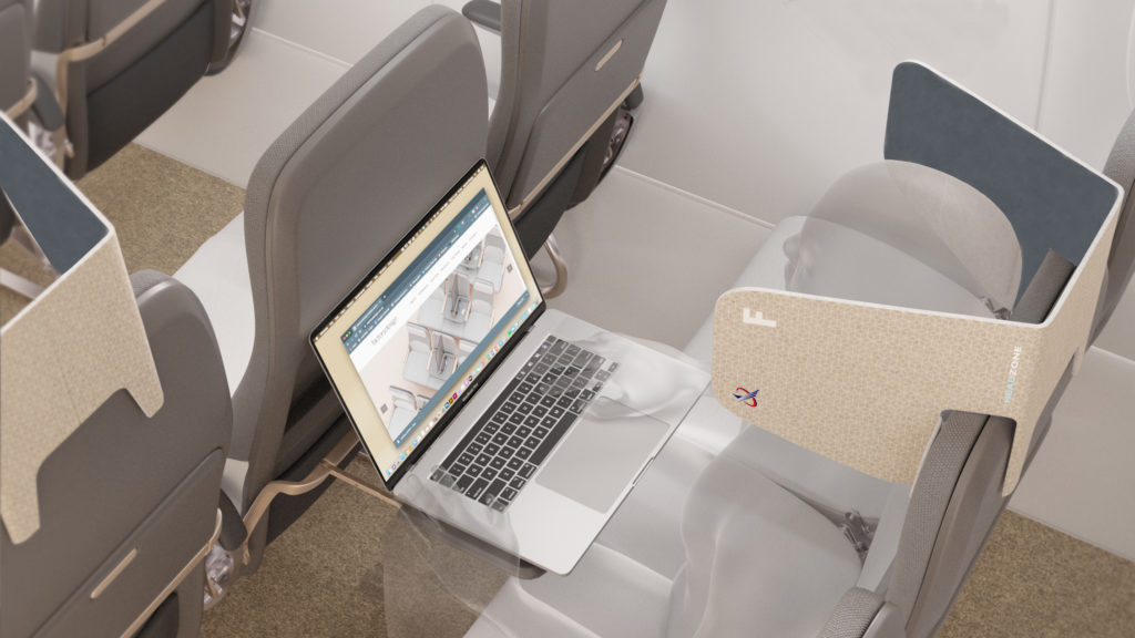 A graphic of passenger seated in a middle seat with the cardboard HeadZone product attached. The passenger is using a laptop on the tray table.