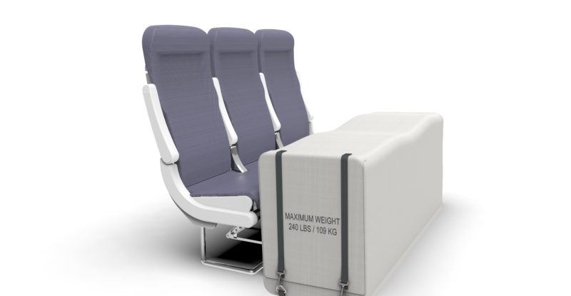 Aircraft slimline seats in greay with the storwage floor mount place in front of it on a white background