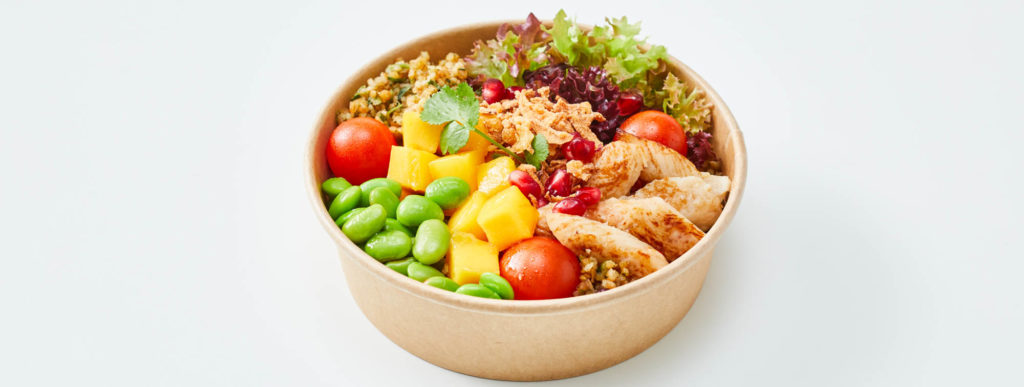 crunchy chicken bowl photographed on a white background