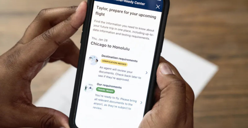 hand holding a device showing a landing page of the app which says "tailor your upcoming flight" and then provides details