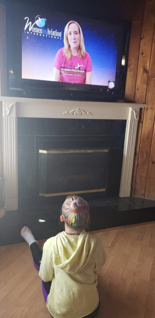 Lyrik, sitting on the floor of her living room watching host Allison McKay start off the program