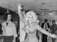 Country and Western singer Dolly Parton leaving Heathrow Airport after her popular appearance at The Country and Western music festival at Wembley.