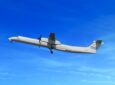 Connect Airlines Q400 in flight with a clear blue sky.
