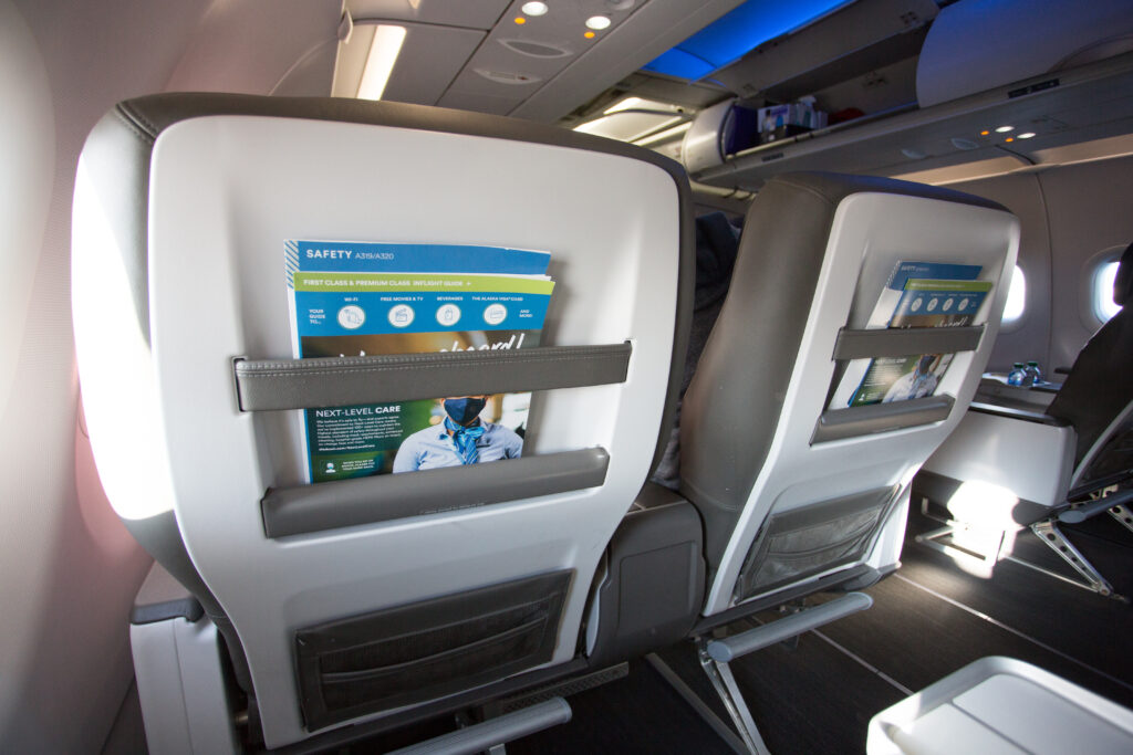 Back of the first class seat showing the literature pocket.