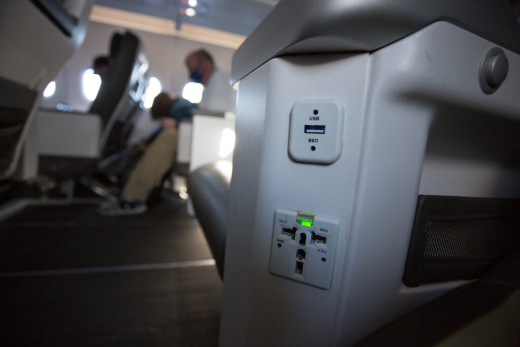 In-seat power ports on the first class seat. 110v and USB