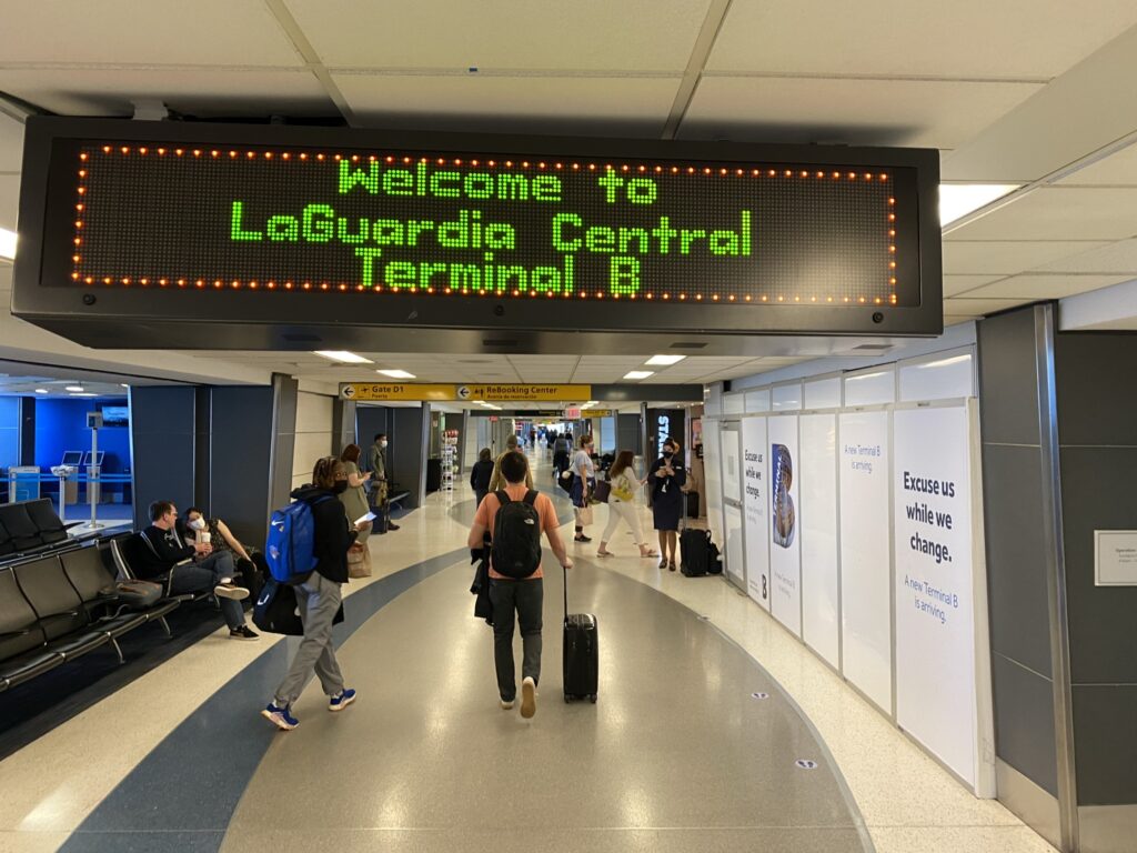 Welcome to LaGuardia Central Terminal B is on a digital sign as you enter the airport.