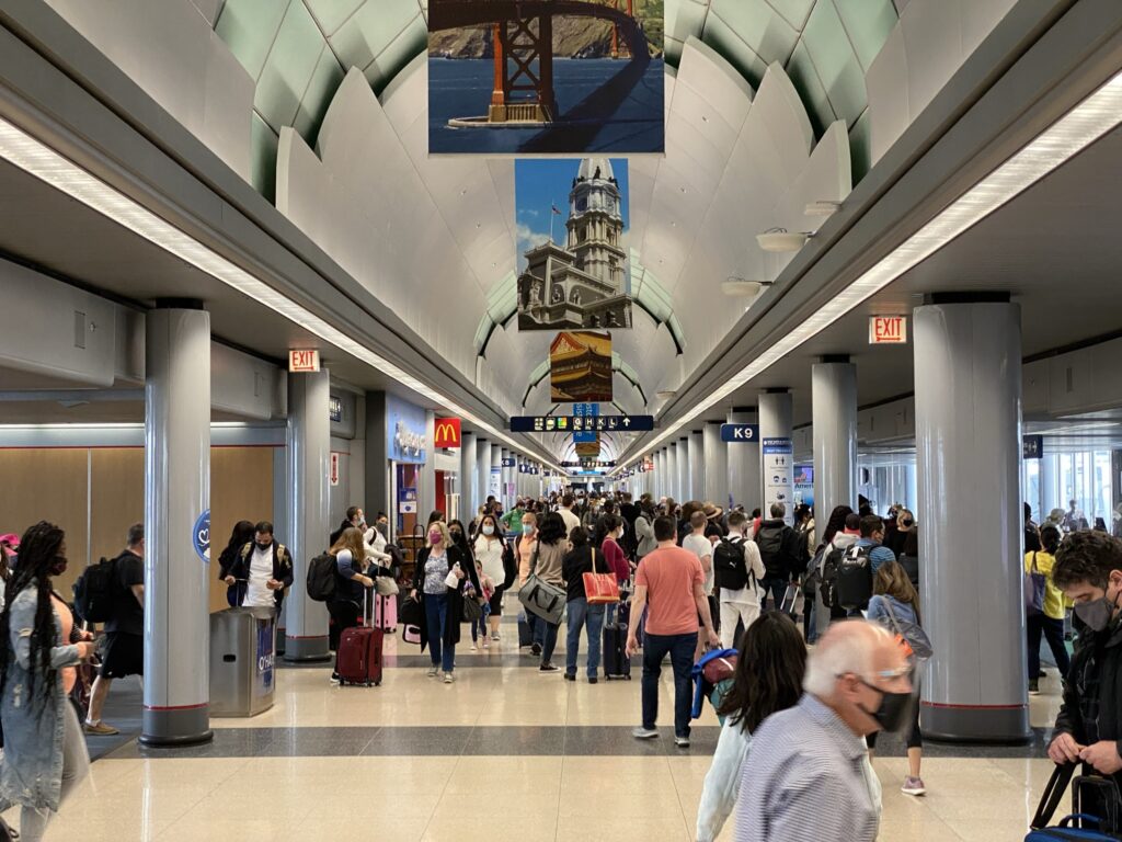 O'Hare terminal buzzing with people.