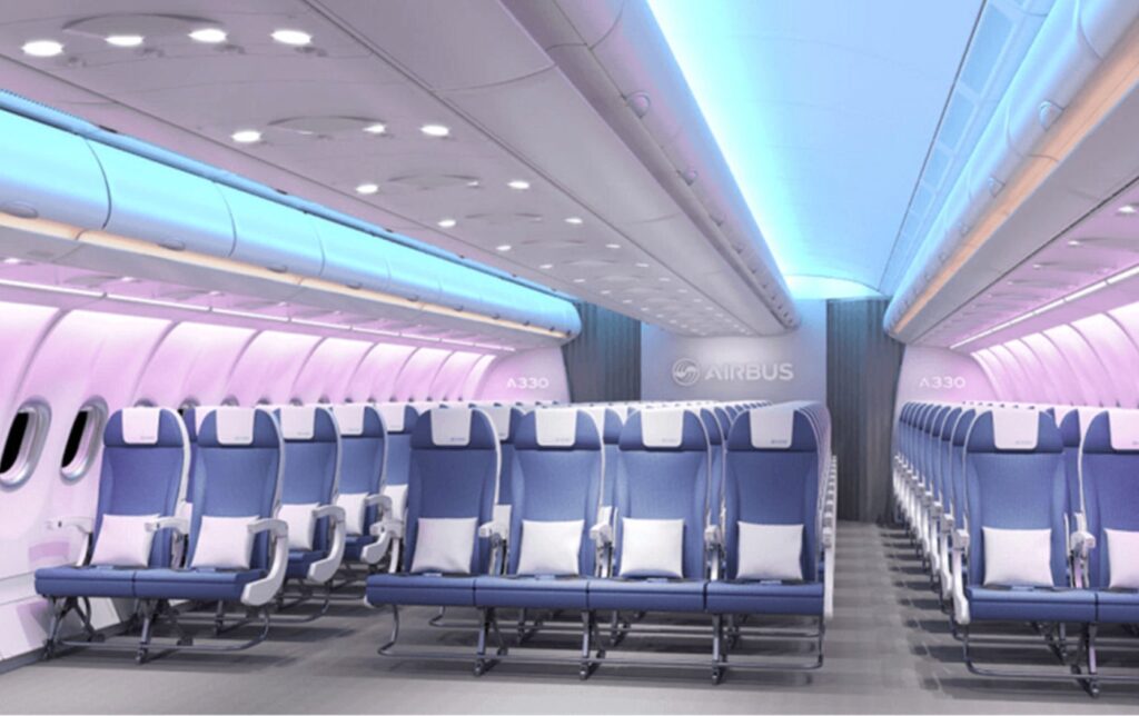 Bright pink and blue hues are seen in this Airbus widebody with Spectrum mood lighting