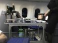 Aircraft trolley with a display of a first course meal