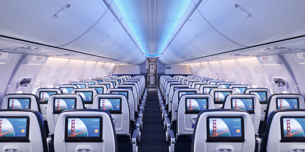 A rendering showing rows of seats with seatback IFE on board the 737 MAX 8