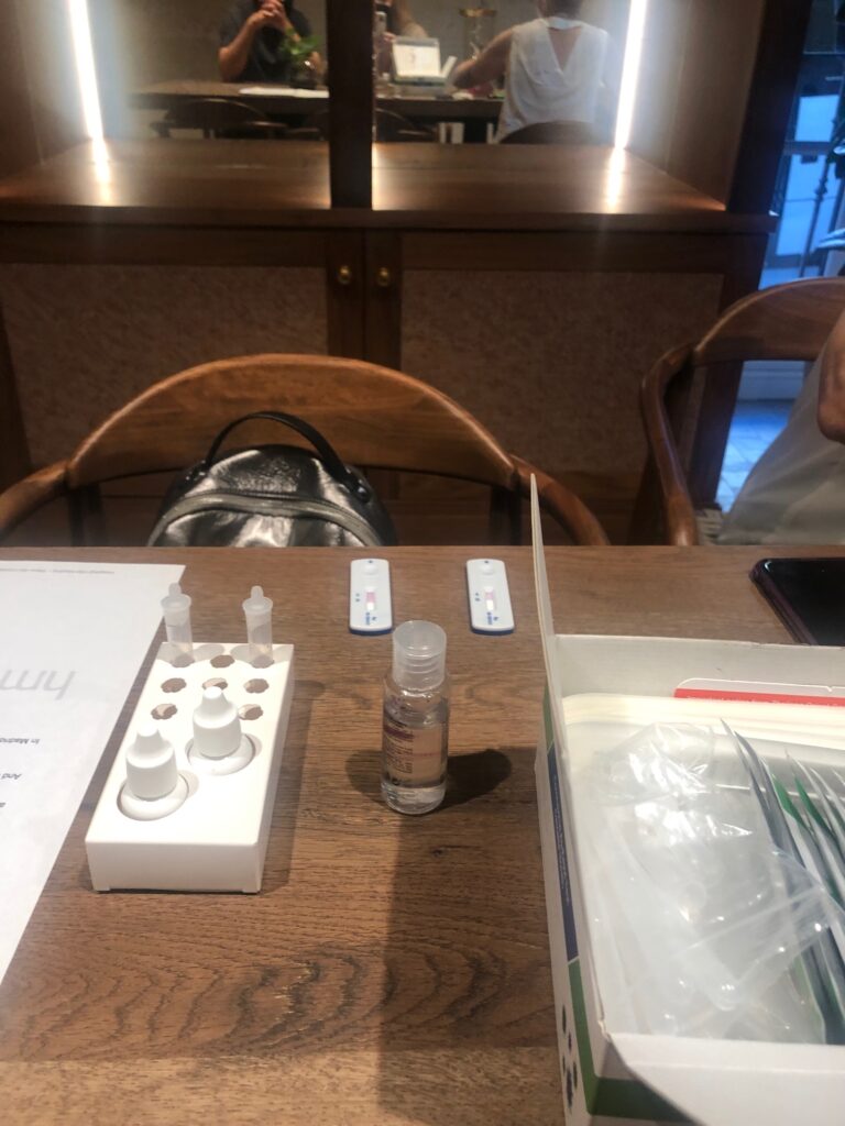 COVID-19 test kit on a table at a hotel