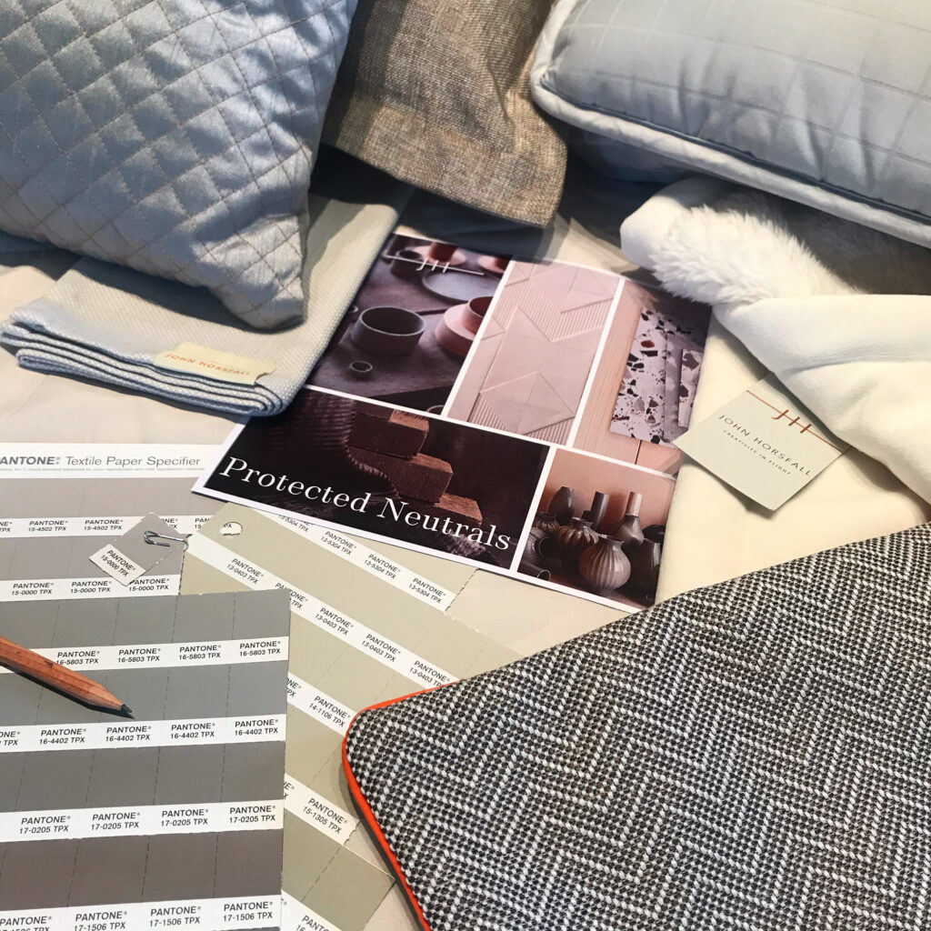 Grey and white neutral colours of fabrics to represent Protected Neutrals by John Horsfall