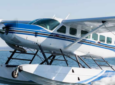 Tailwind Air aircraft landing on the water.