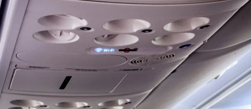 Wi-Fi sign on board an aircraft, in the PSU. The service powers onboard Internet.