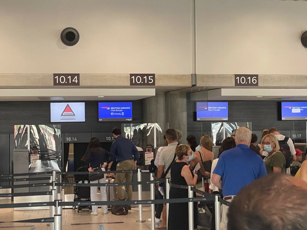 Long lines at the bag drop portion of the airport.