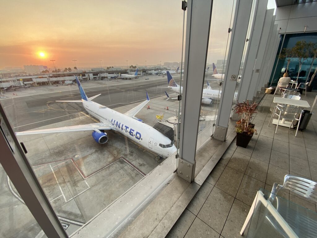 United Airlines Aircraft visible from the window of the United Club lounge in LAX.