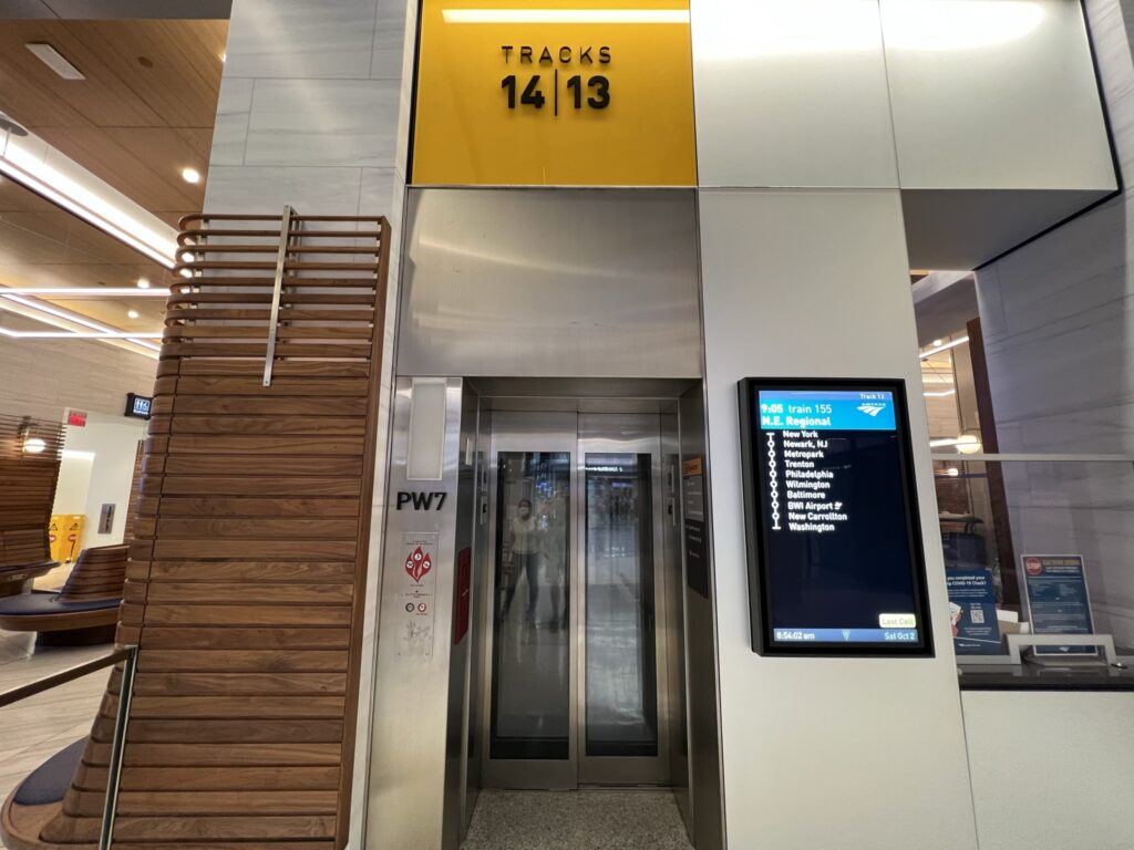 Single escalater leading to the Amtrak train's boarding area.