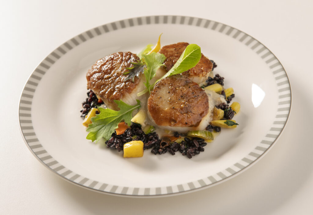 Scallops with cauliflower sauce, wild rice and beurre noisette by SIA and Golden Door.