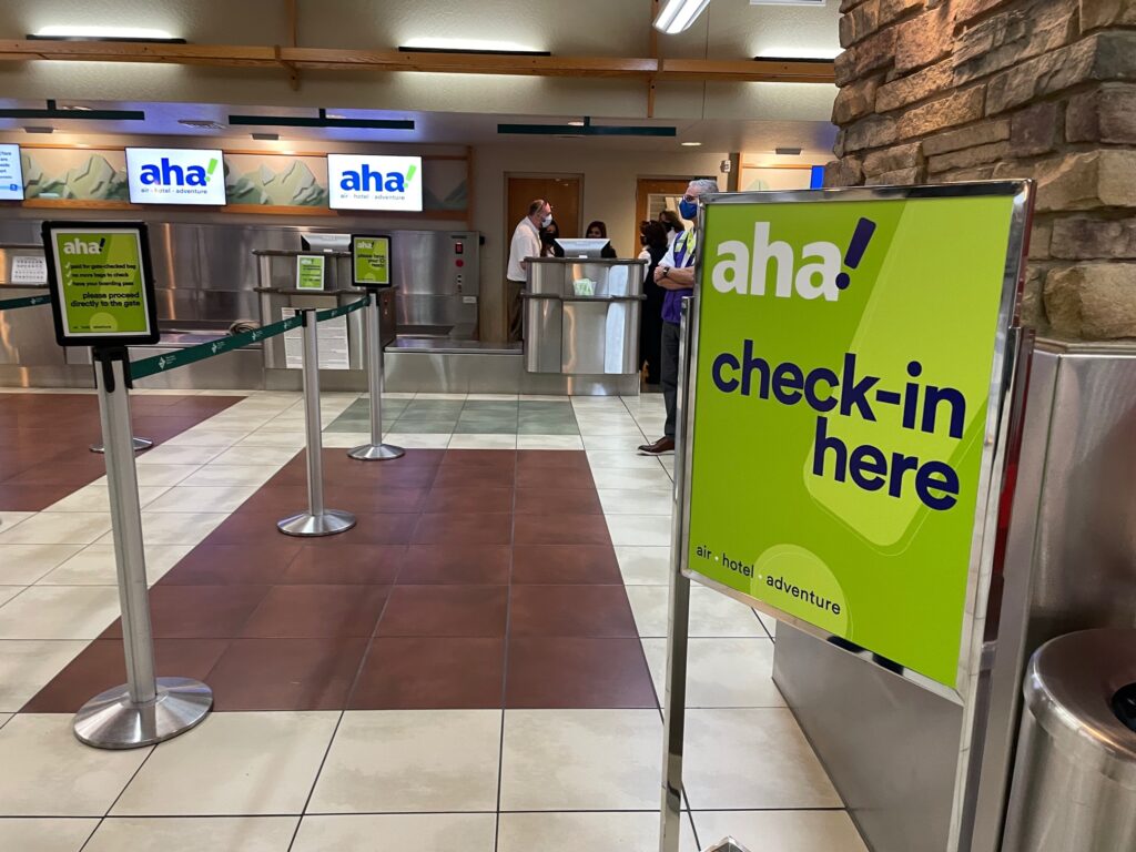 An aha! sign showing where check-in starts