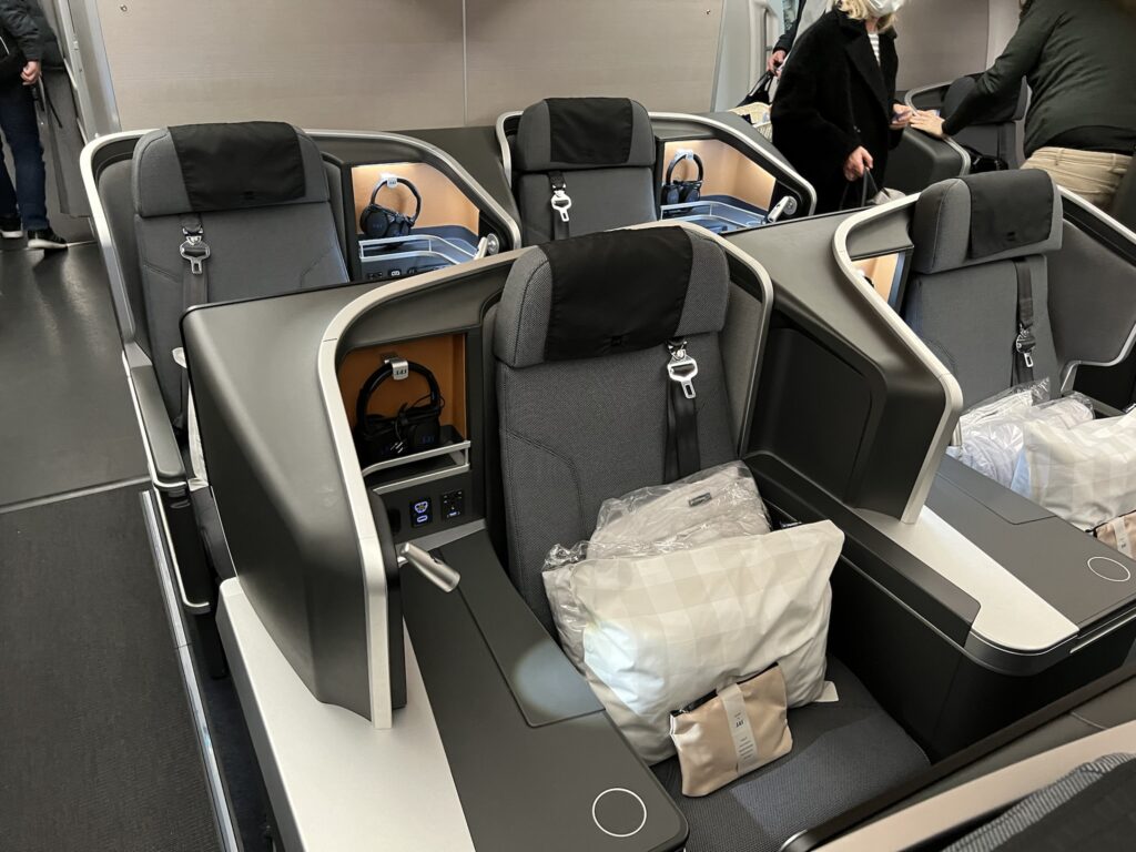 SAS Airbus A350 business class seat in brown, grey and cream accents, with direct aisle access