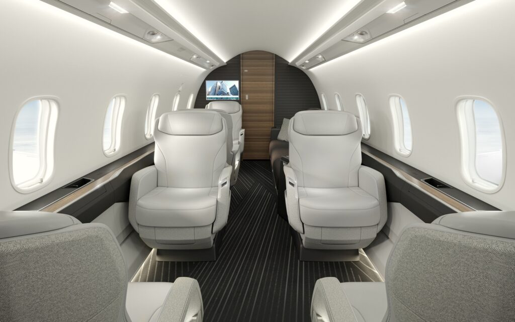 Challenger 3500 Cabin interior. White seats sit in the cabin with chocolate floors and trimming. FACC will be working on the interior.