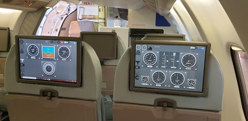 Cranfield University’s National Flying Laboratory Centre Flying Classroom is picture here. Starling Aerospace has equipped the aircraft with Microsoft Surface Pro tablets in the headrests of the Saab 340 cabin seats. The remainder of the seat is various beige and brown colors.