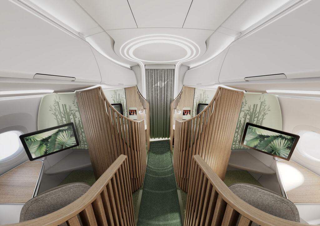 Teague's Elevate business class seat attached to the aircraft via a Ebrace is pictured here. The area is spacious with IFE screens, large windows and sage green accents along with Bamboo fixtures encasing each seat.